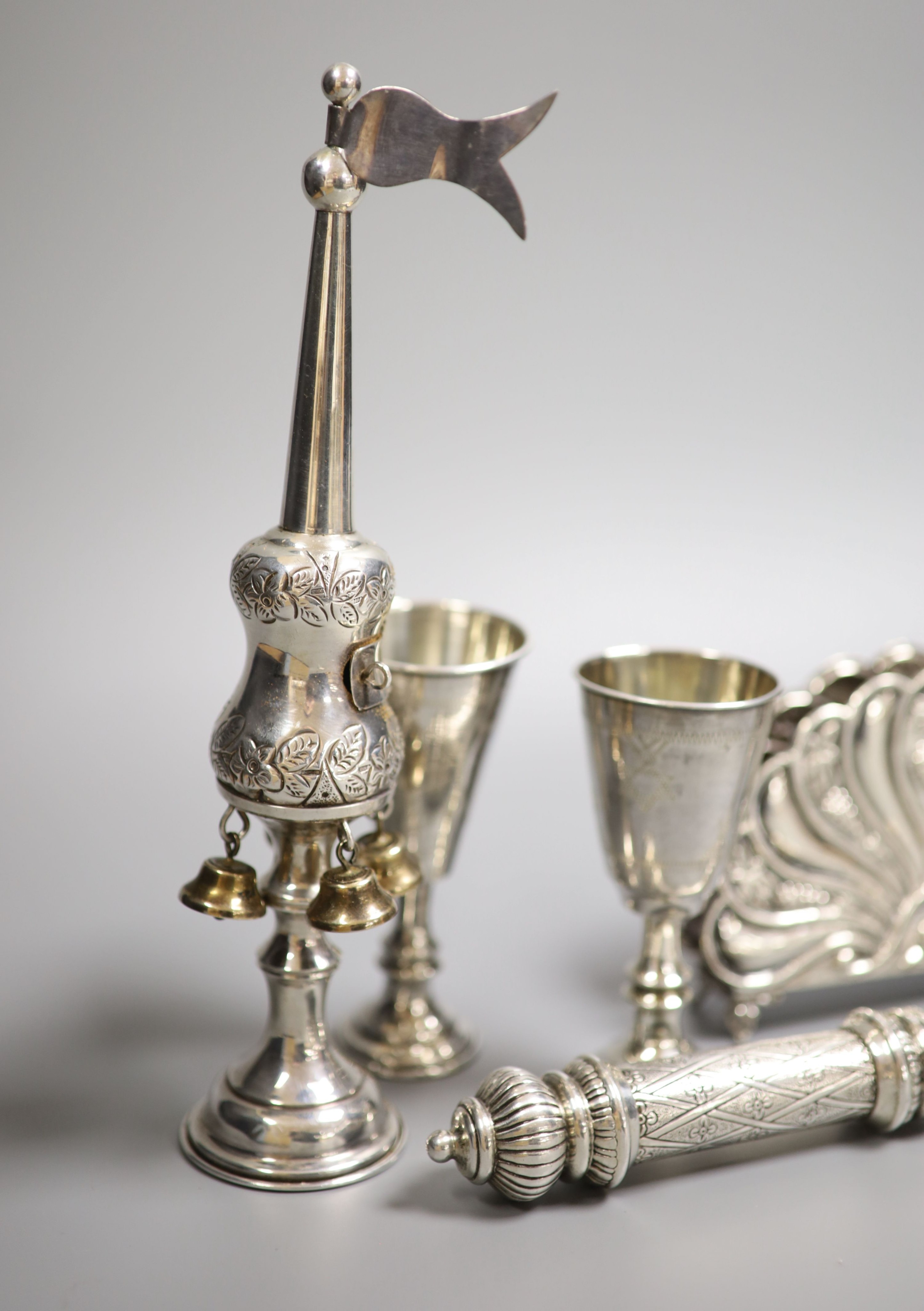 Four George V silver kiddush cups, largest 10.9cm, two other Judaic items, a 925 letter rack, silver napkin ring and Edwardian silver sugar basket.